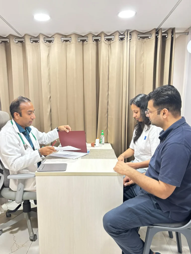 Doctor-Supervised Wellness Consultation in Gurugram Doctor consulting patients at Salubrity Integrative Wellness Clinic in Gurugram for personalised wellness care and treatment planning